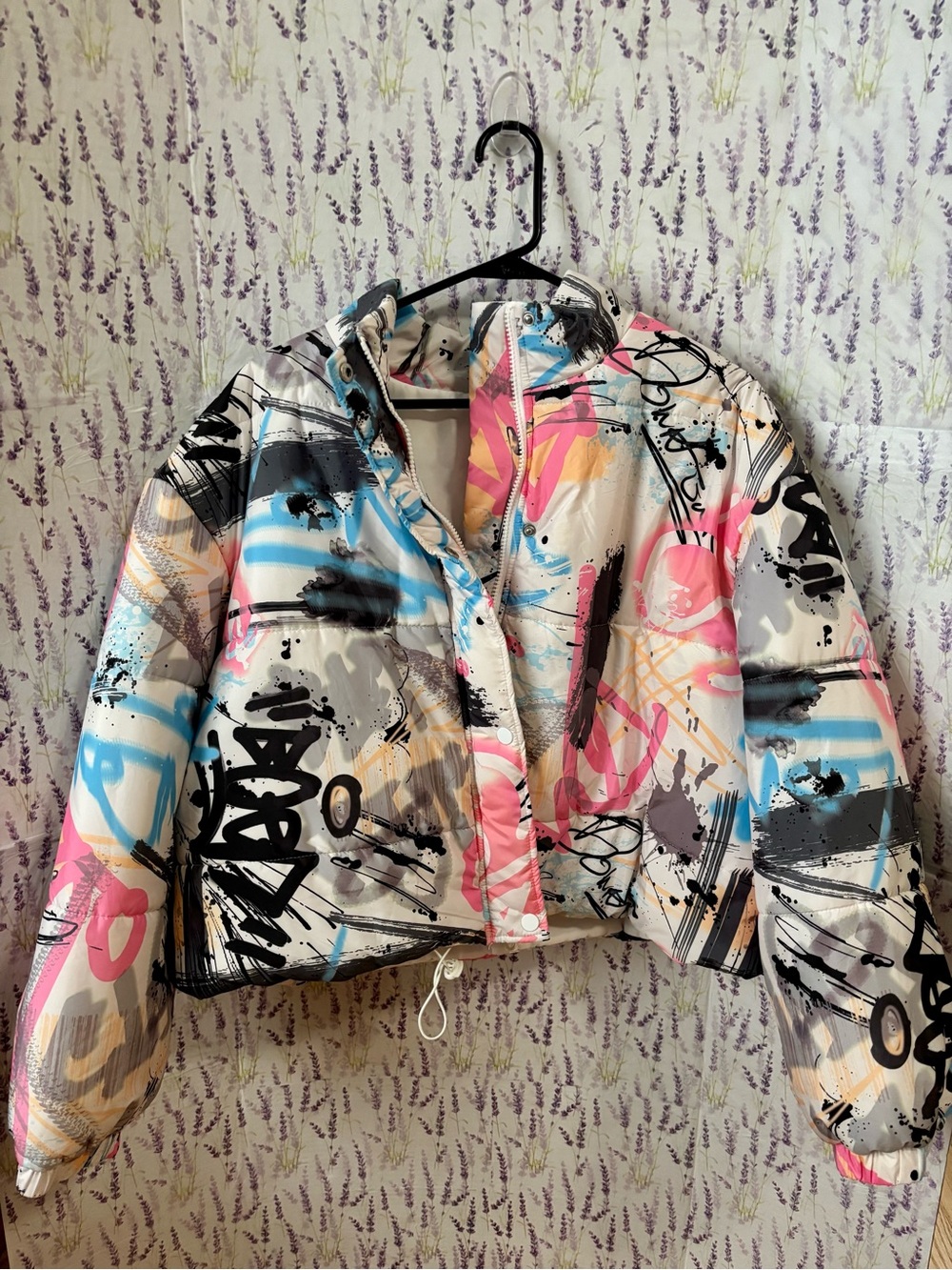 Graffiti-Print Cropped Puffer Jacket in White with Pink & Blue Accents